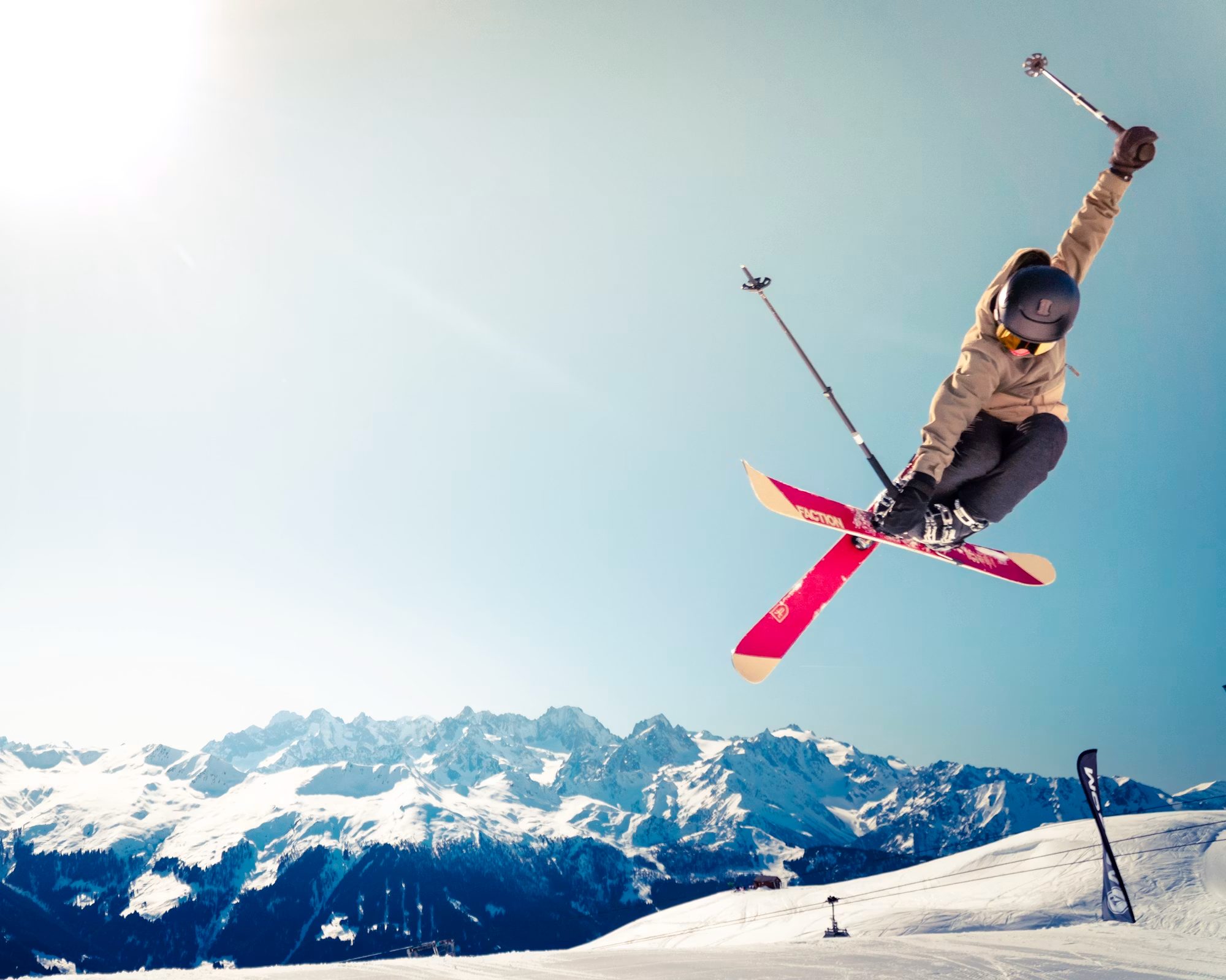 Ski jumper in alpine terrain